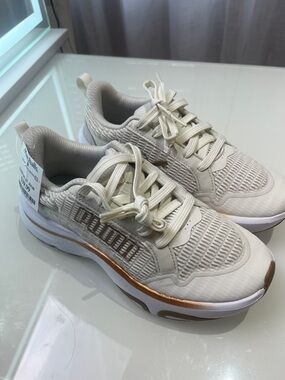 Puma Women's Cream Sneakers with Metallic Rose Gold Trim